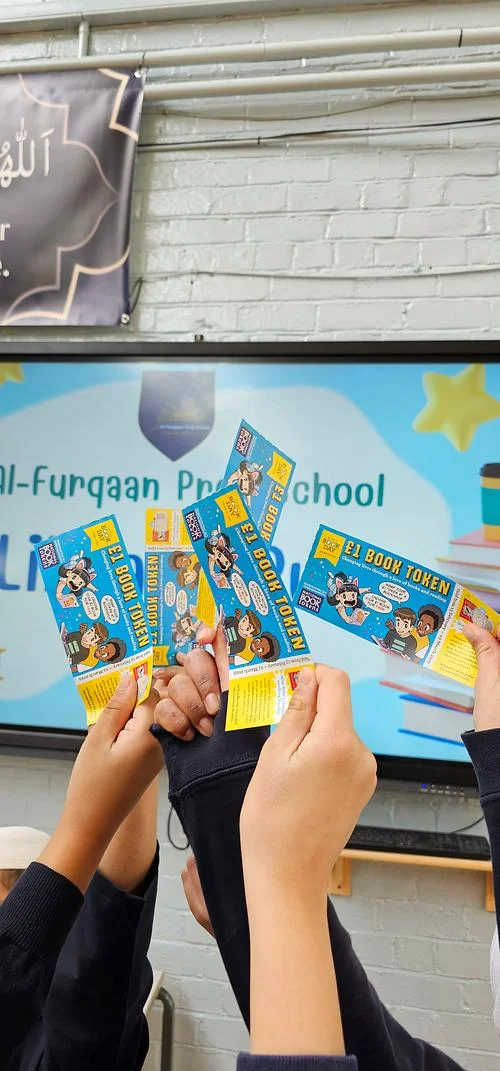 children holding token tickets